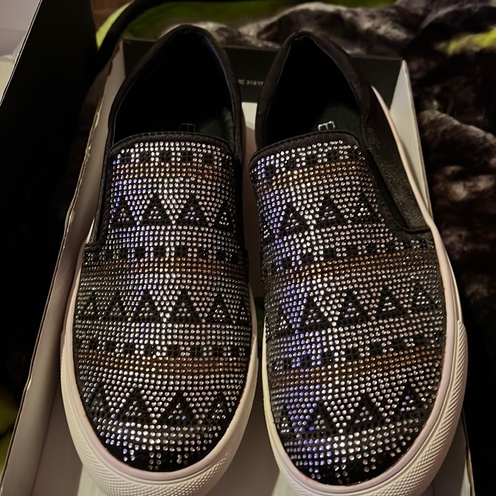 Never worn size 9 slip on shoe black color with black gold silver rhinestones